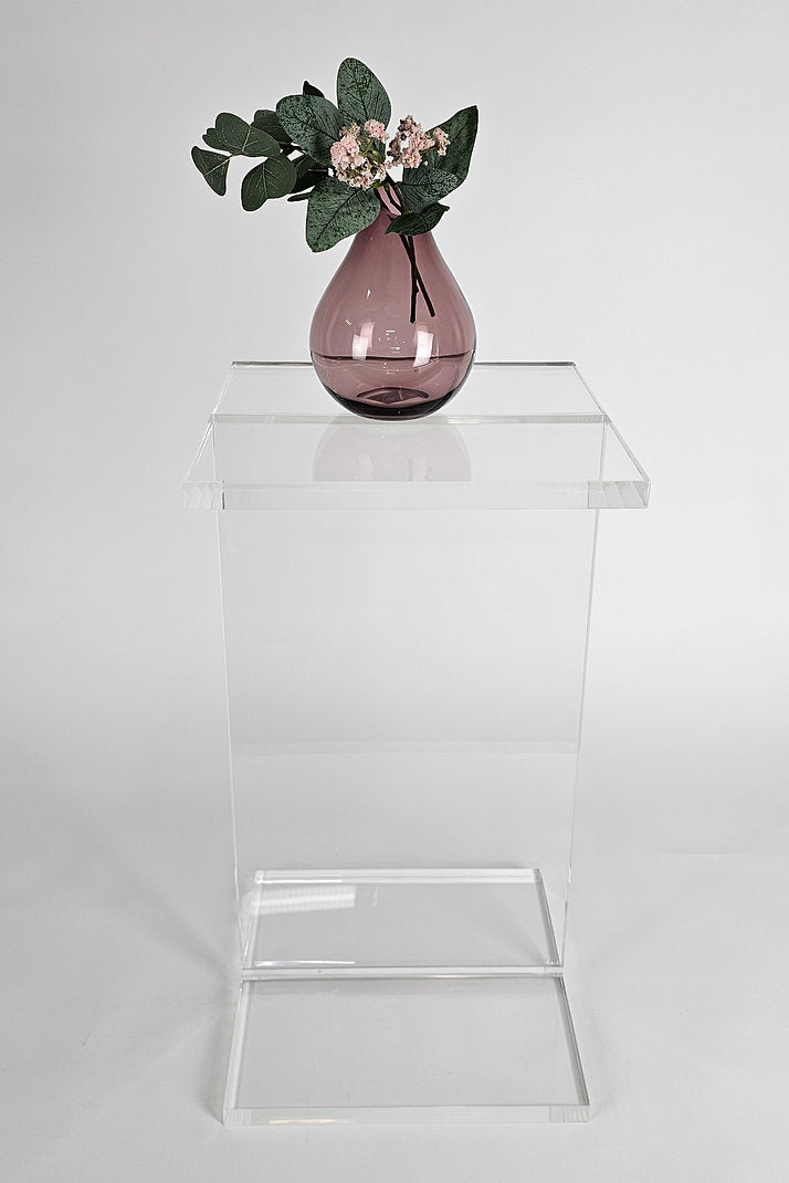 Clear acrylic end table with a minimalist I-beam design