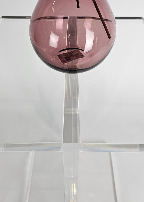 Clear acrylic end table with a minimalist I-beam design