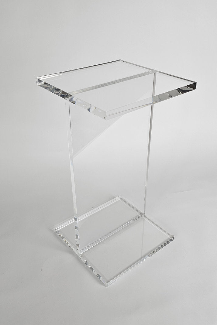 Clear acrylic end table with a minimalist I-beam design