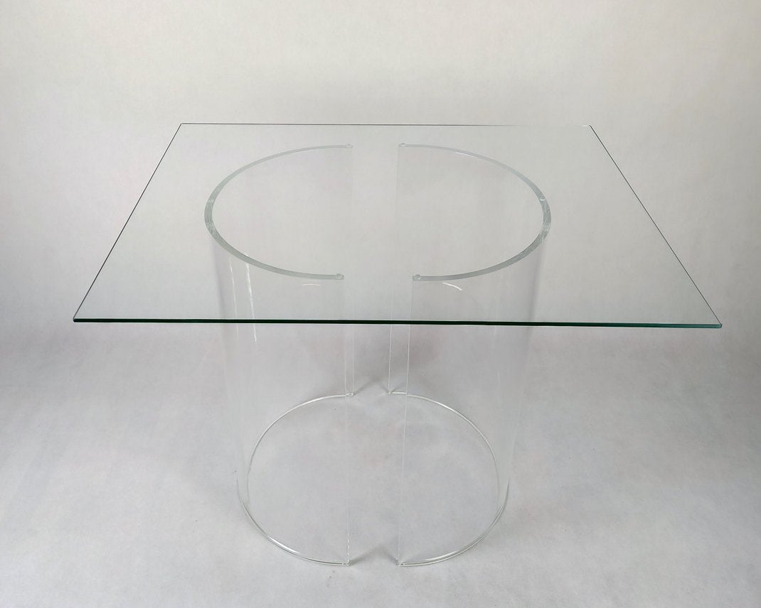 Clear acrylic table base with a c-shaped cross section