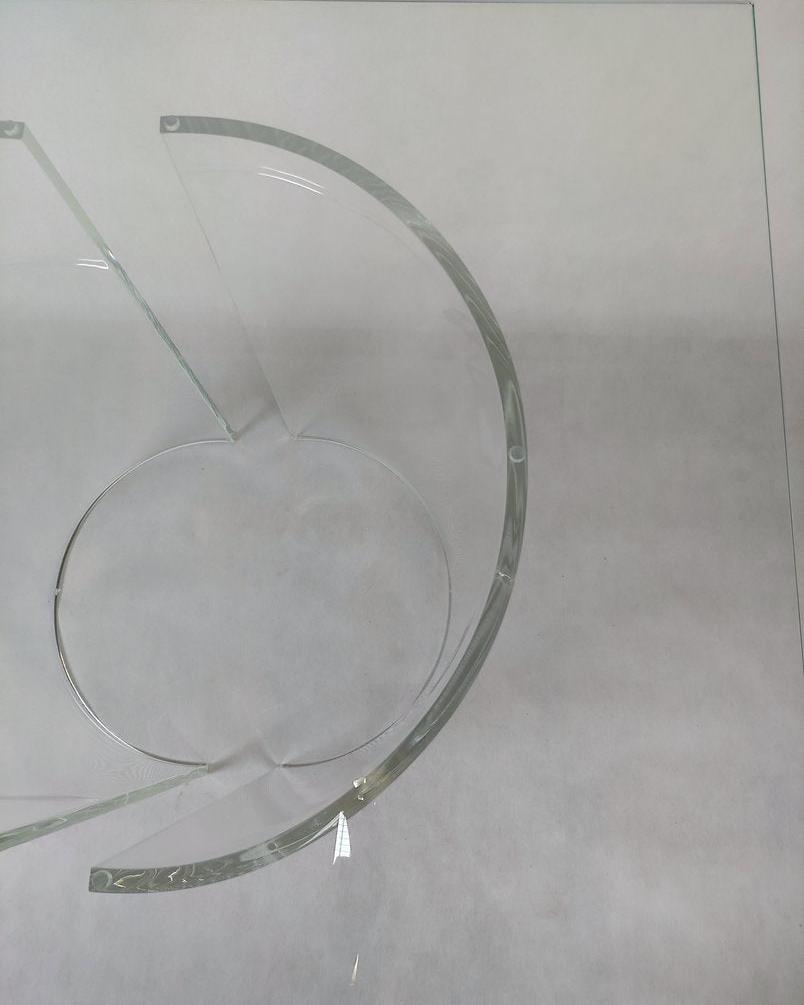 Clear acrylic table base with a c-shaped cross section