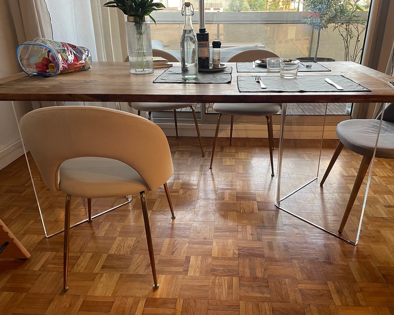 Clear acrylic table base with a v-shaped cross section