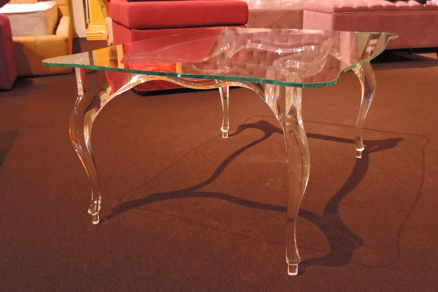 Clear acrylic coffee table with a regal and elegant style