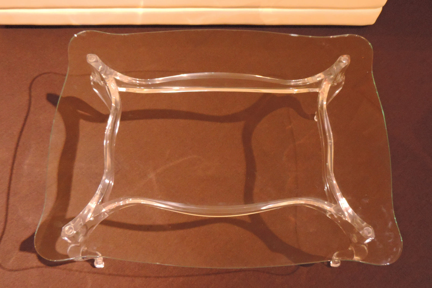 Clear acrylic coffee table with a regal and elegant style