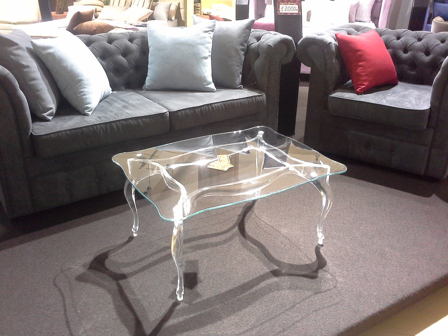 Clear acrylic coffee table with a regal and elegant style