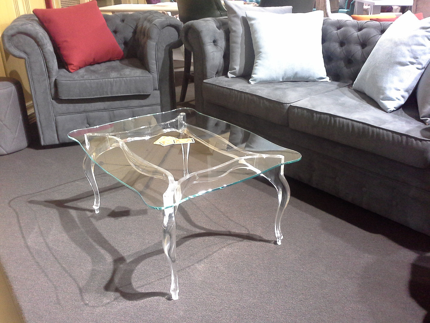 Clear acrylic coffee table with a regal and elegant style
