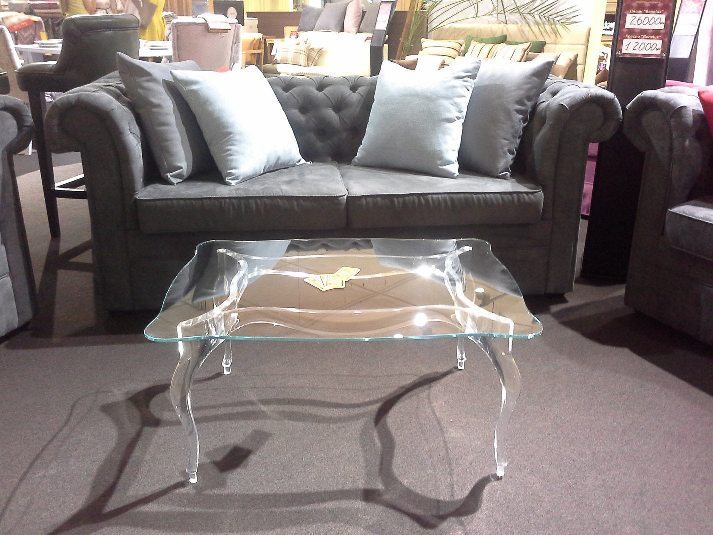 Clear acrylic coffee table with a regal and elegant style