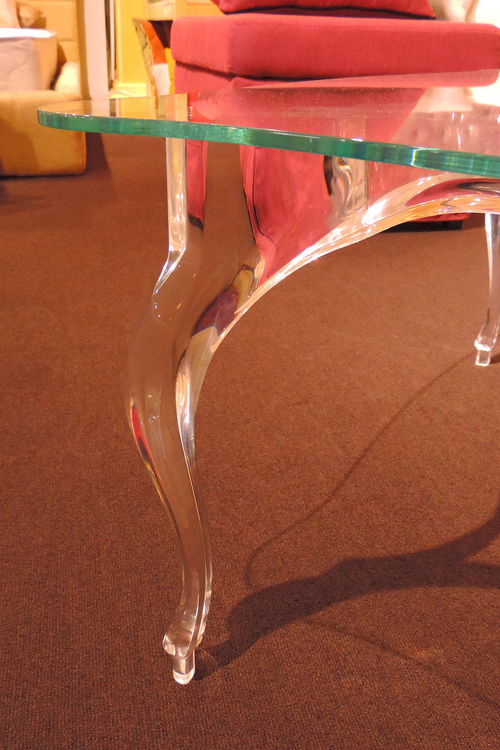 Clear acrylic coffee table with a regal and elegant style