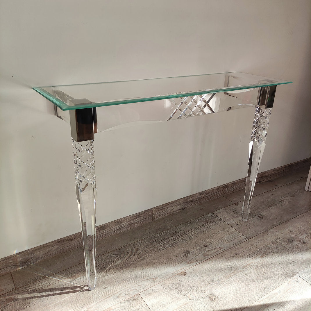 Clear acrylic console table with chrome accents