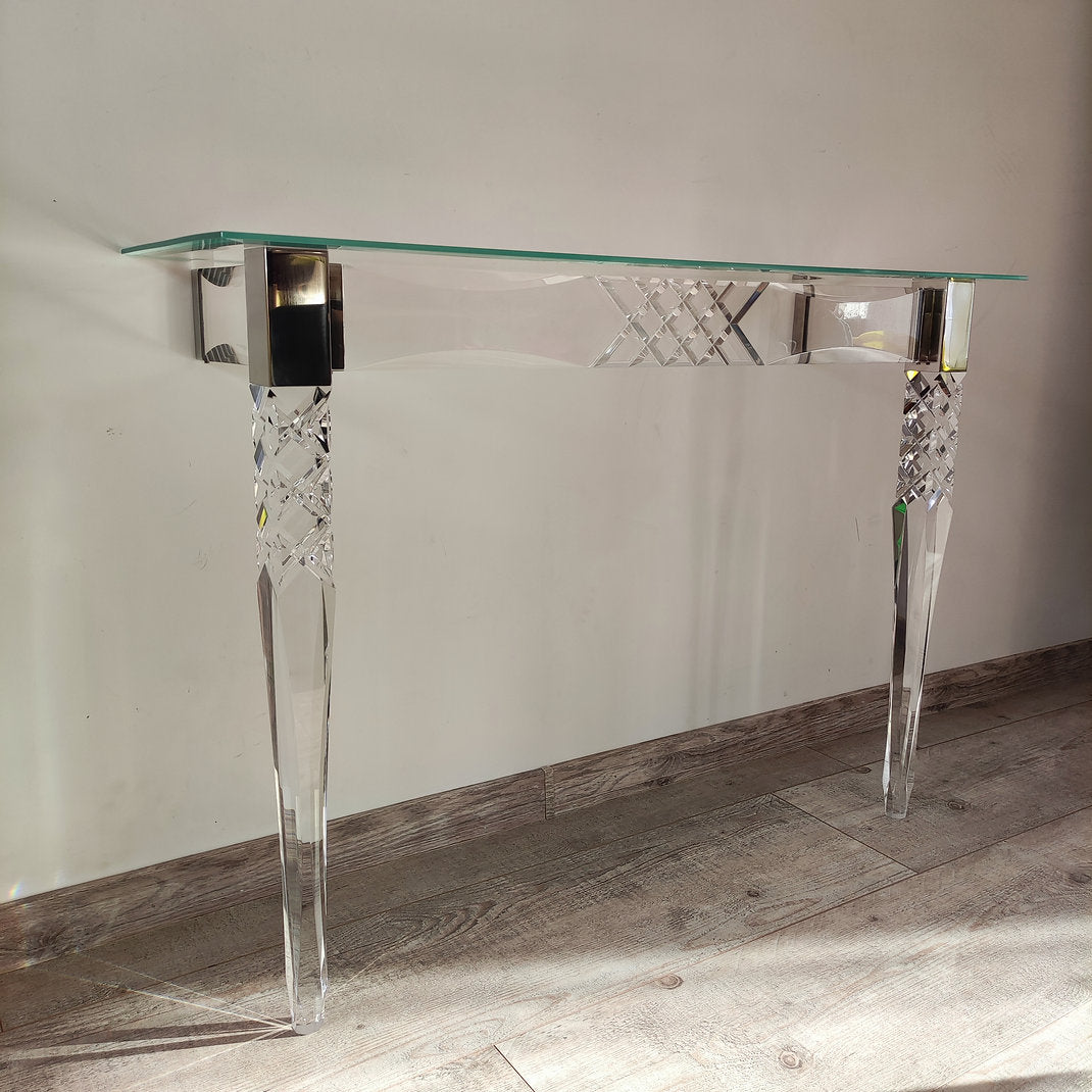 Clear acrylic console table with chrome accents