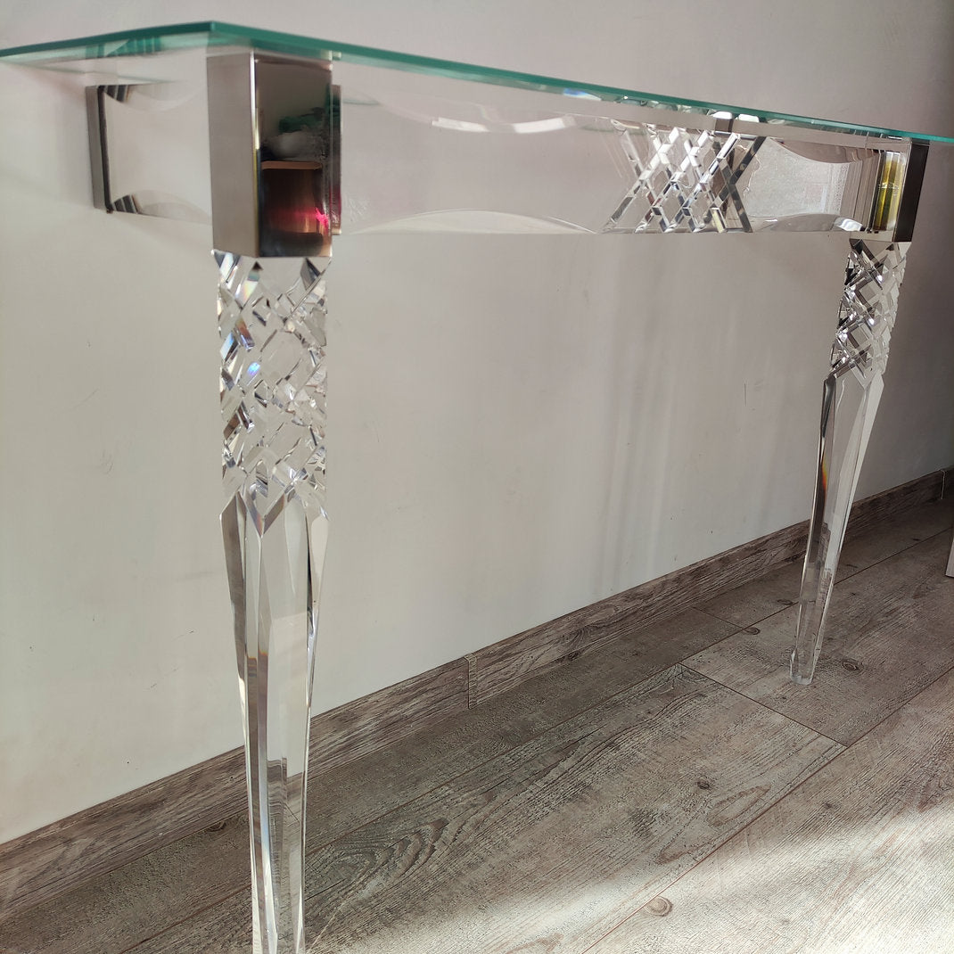 Clear acrylic console table with chrome accents