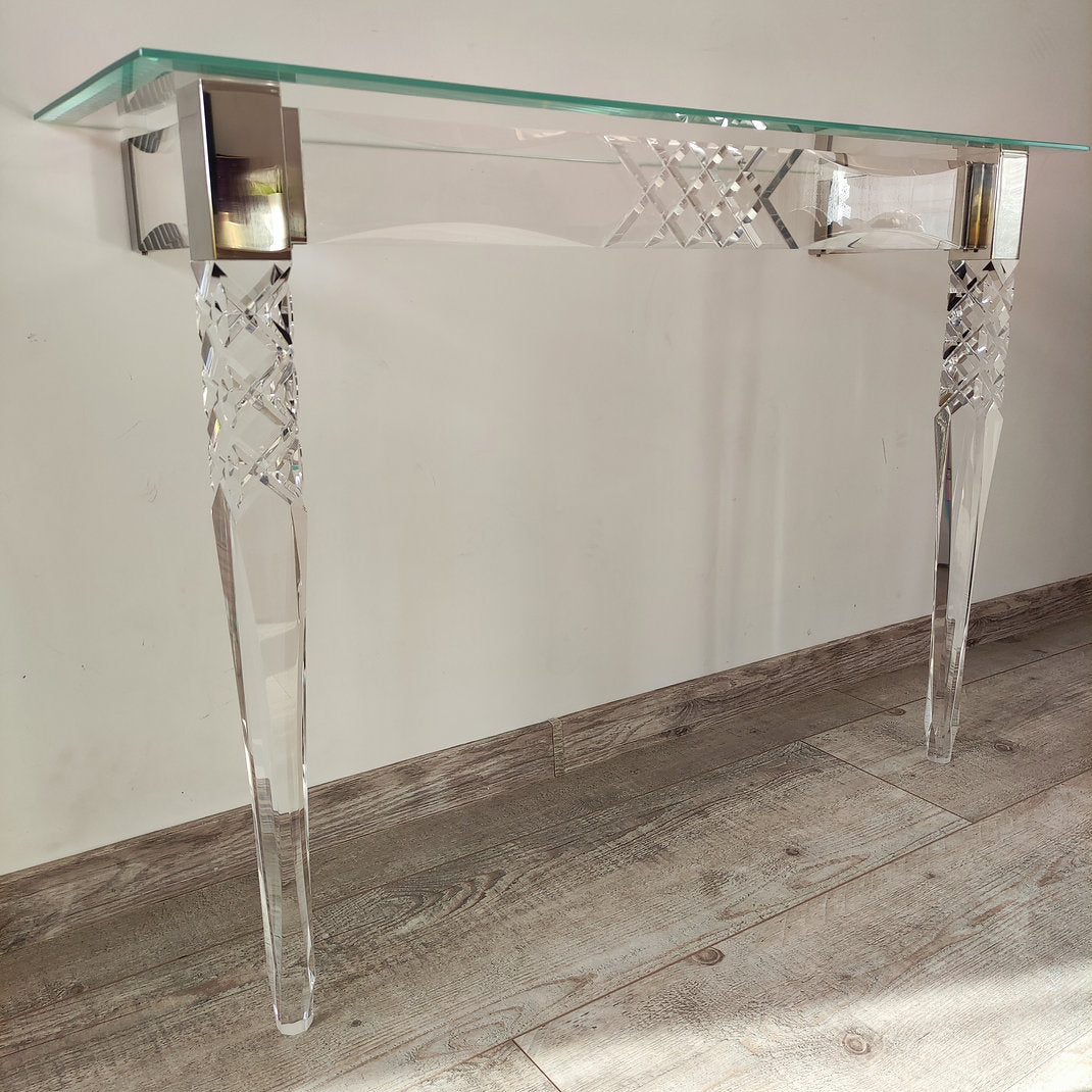 Clear acrylic console table with chrome accents