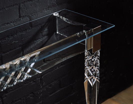 Clear acrylic console table with chrome accents