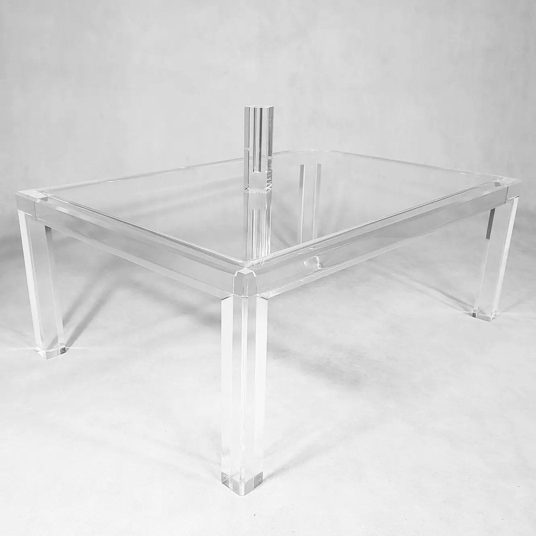 Clear acrylic coffee table with a minimalist rectangular style