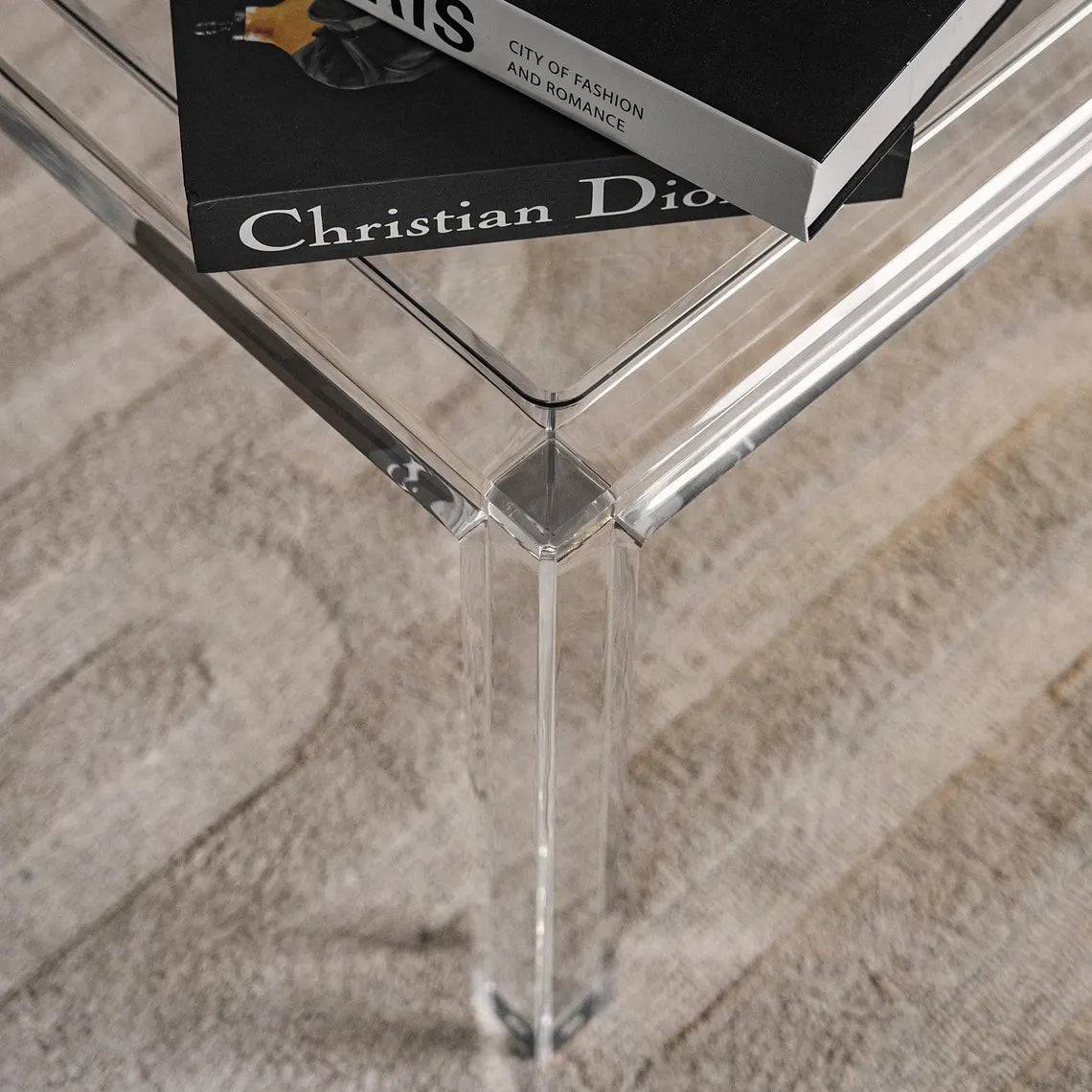 Clear acrylic coffee table with a minimalist rectangular style