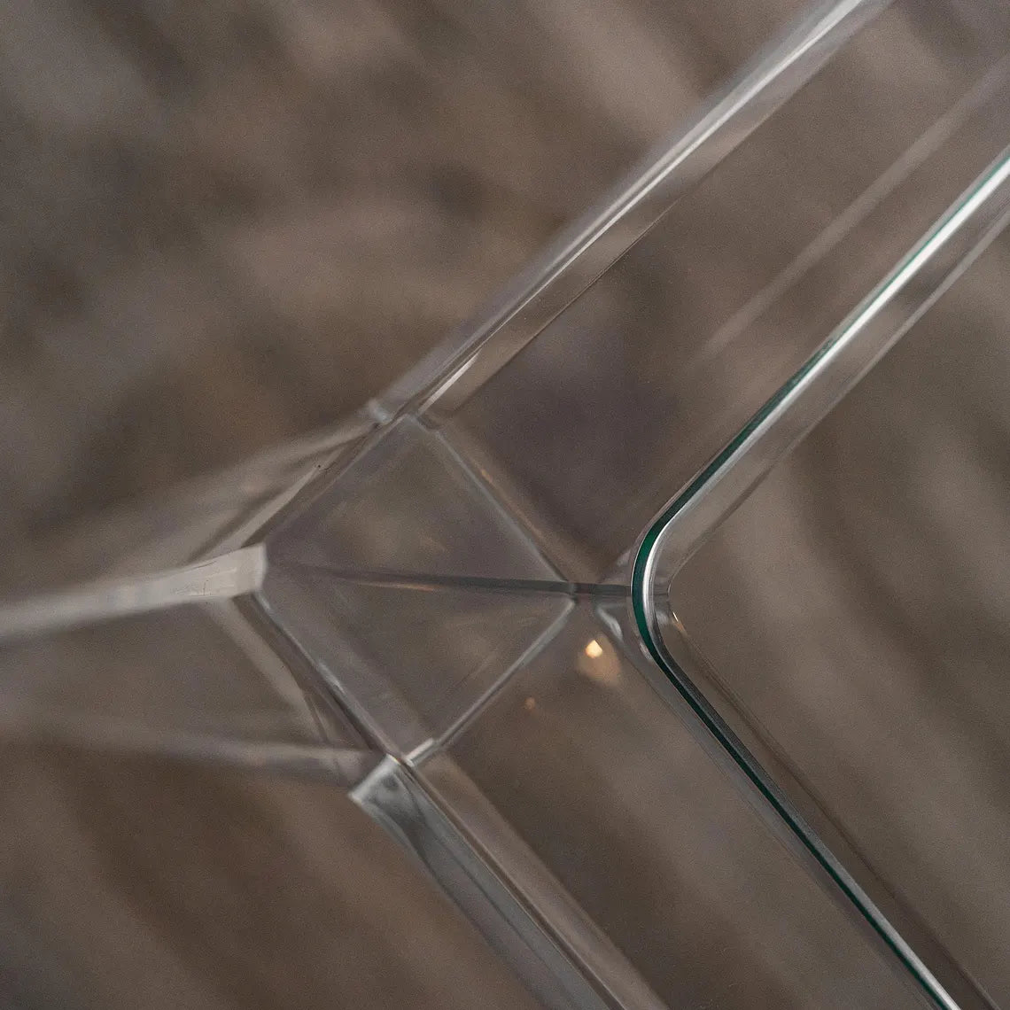 Clear acrylic coffee table with a minimalist rectangular style
