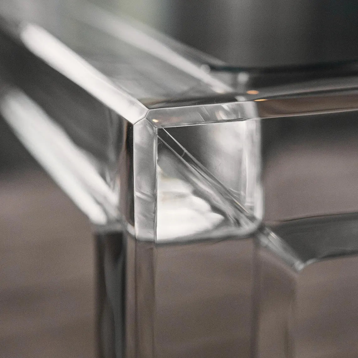 Clear acrylic coffee table with a minimalist rectangular style
