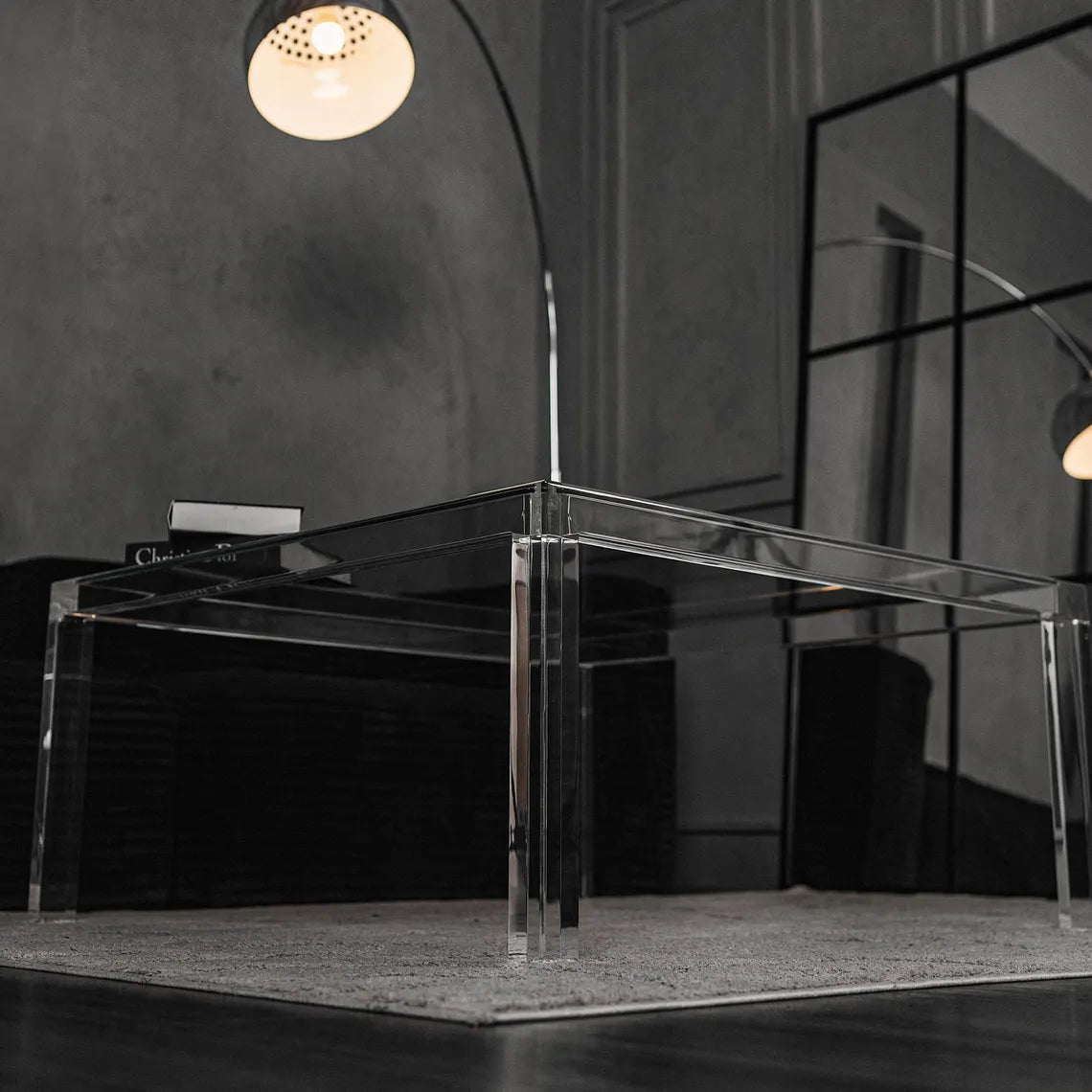 Clear acrylic coffee table with a minimalist rectangular style