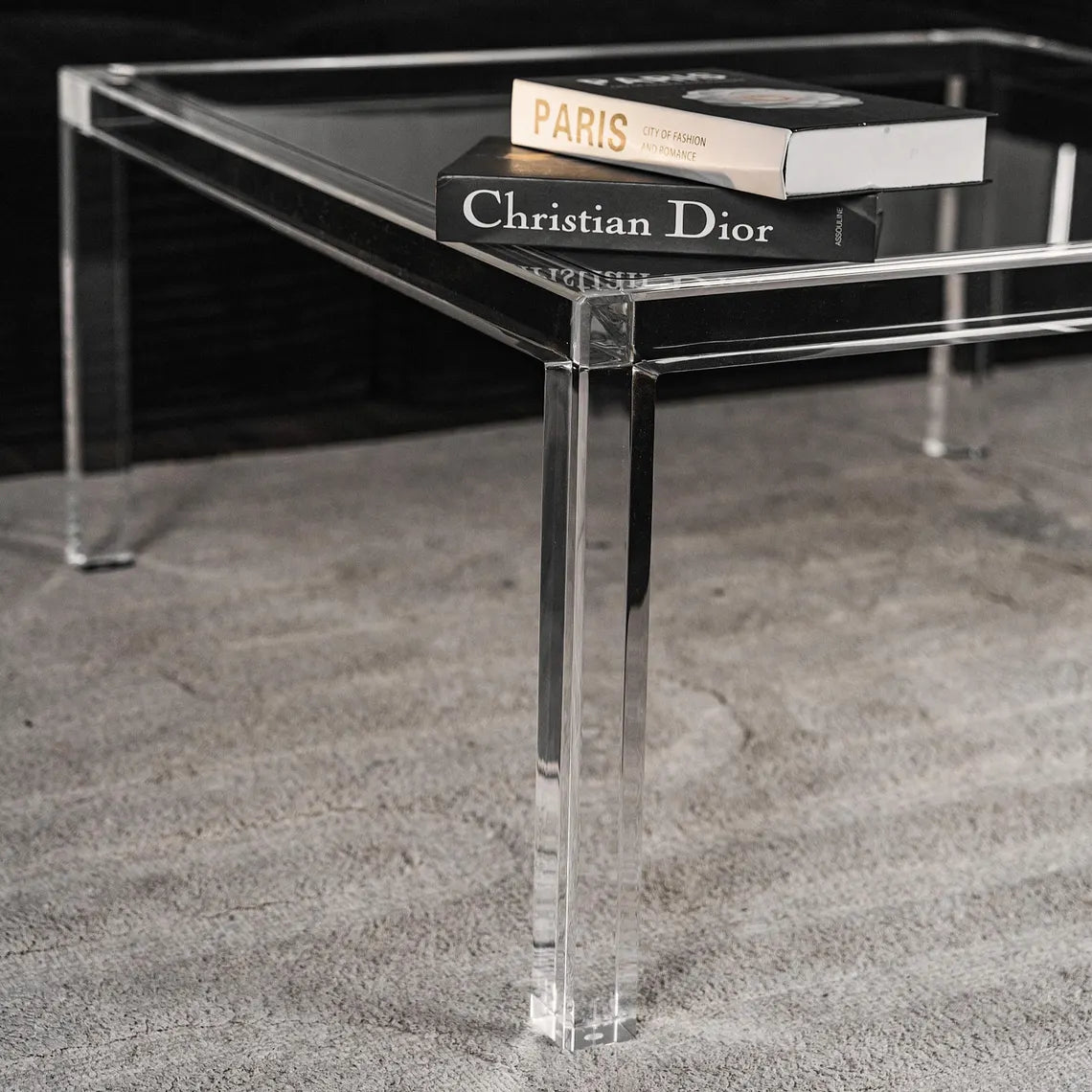 Clear acrylic coffee table with a minimalist rectangular style