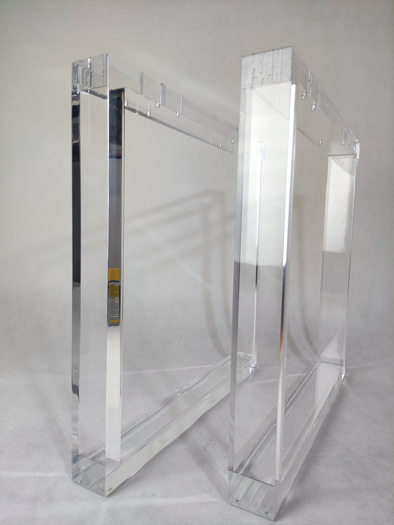 Clear acrylic table base shaped like a square frame