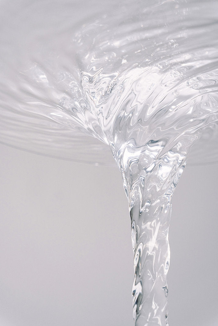 Clear acrylic coffee table that looks like a whirlpool