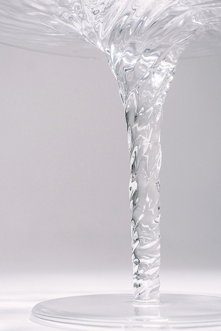 Clear acrylic coffee table that looks like a whirlpool