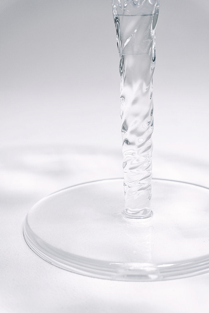 Clear acrylic coffee table that looks like a whirlpool