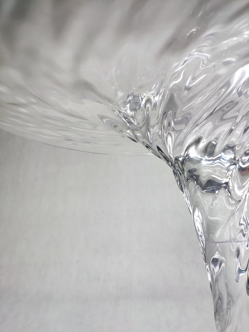 Clear acrylic coffee table that looks like a whirlpool