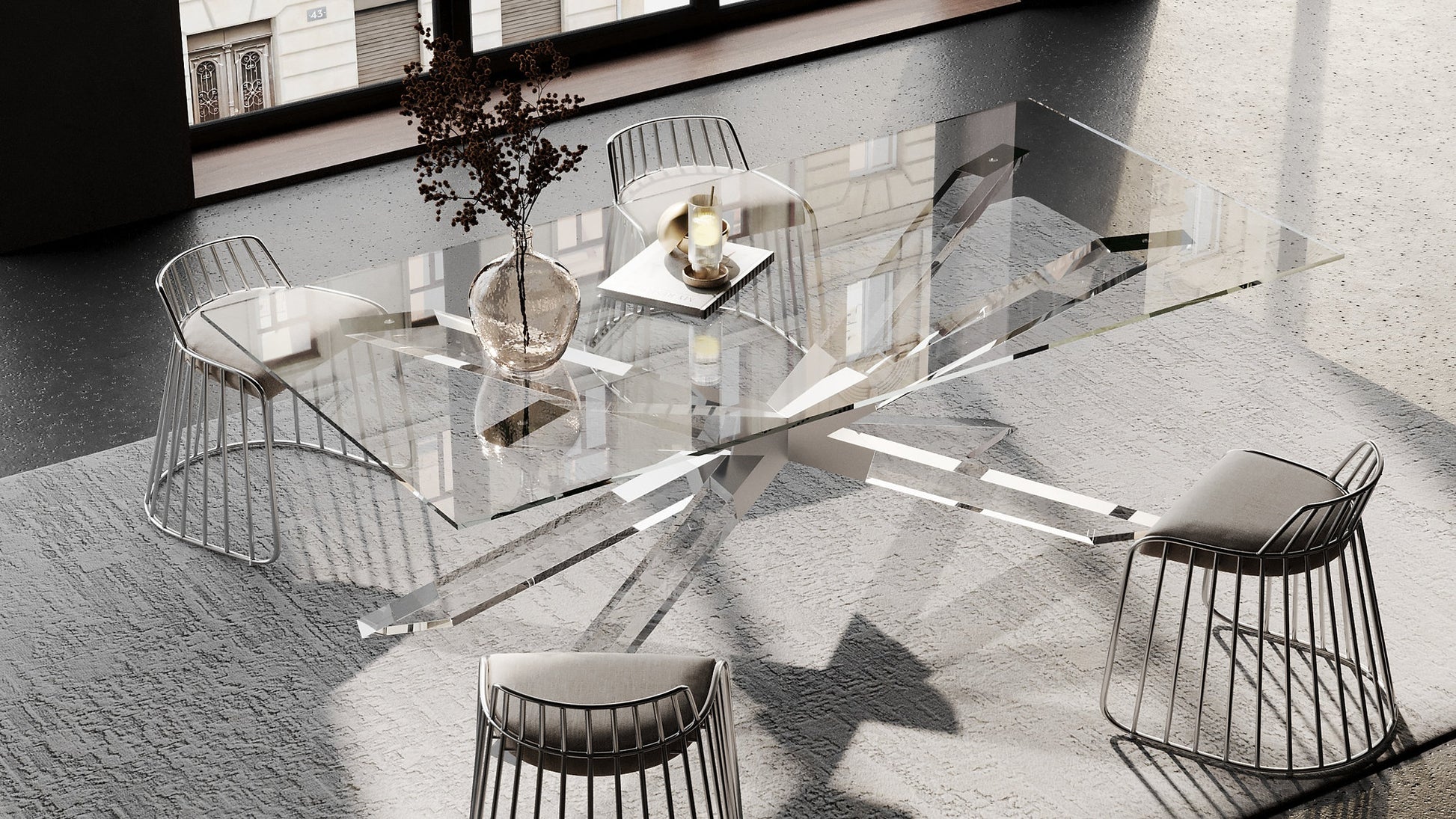 Aerial view of a transparent star-shaped acrylic table base with glass tabletop