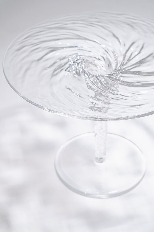 Clear acrylic coffee table that looks like a whirlpool