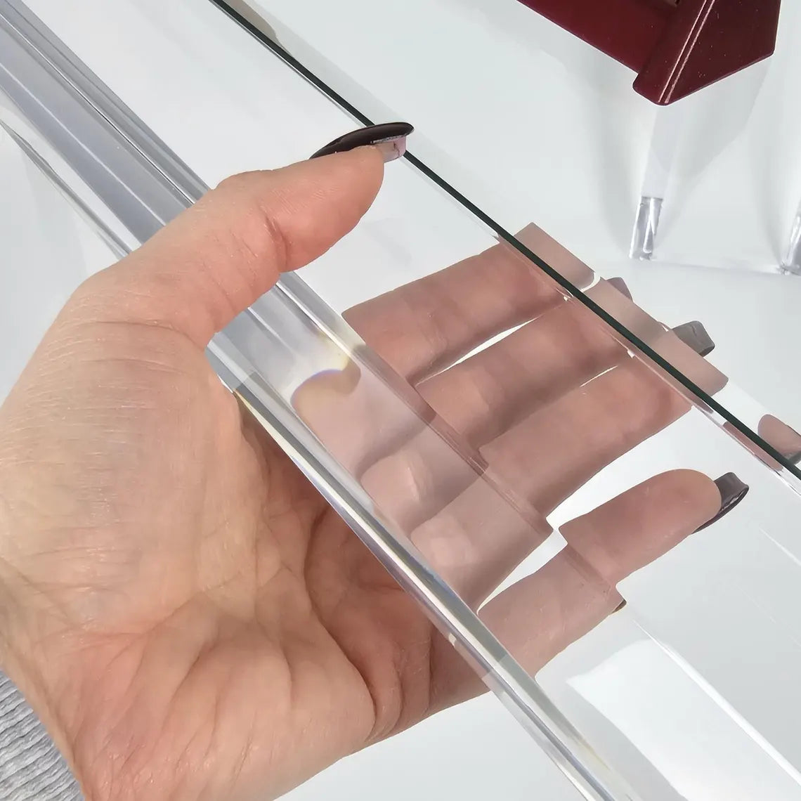 Clear acrylic game table with beveled edges and corners