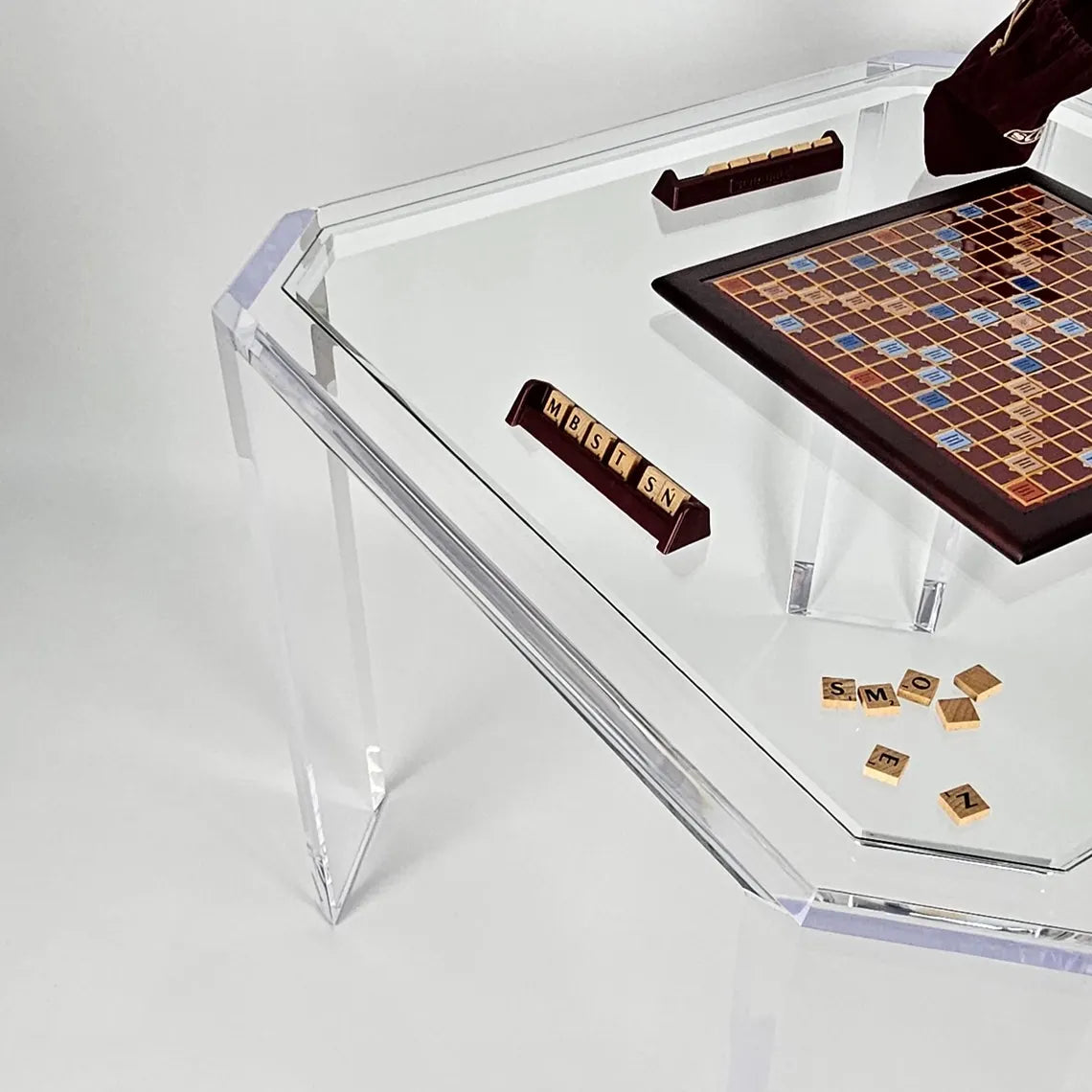 Clear acrylic game table with beveled edges and corners