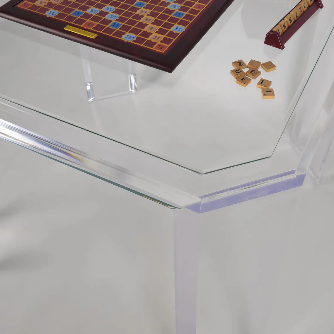 Clear acrylic game table with beveled edges and corners