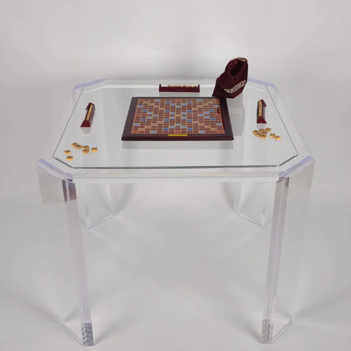 Clear acrylic game table with beveled edges and corners