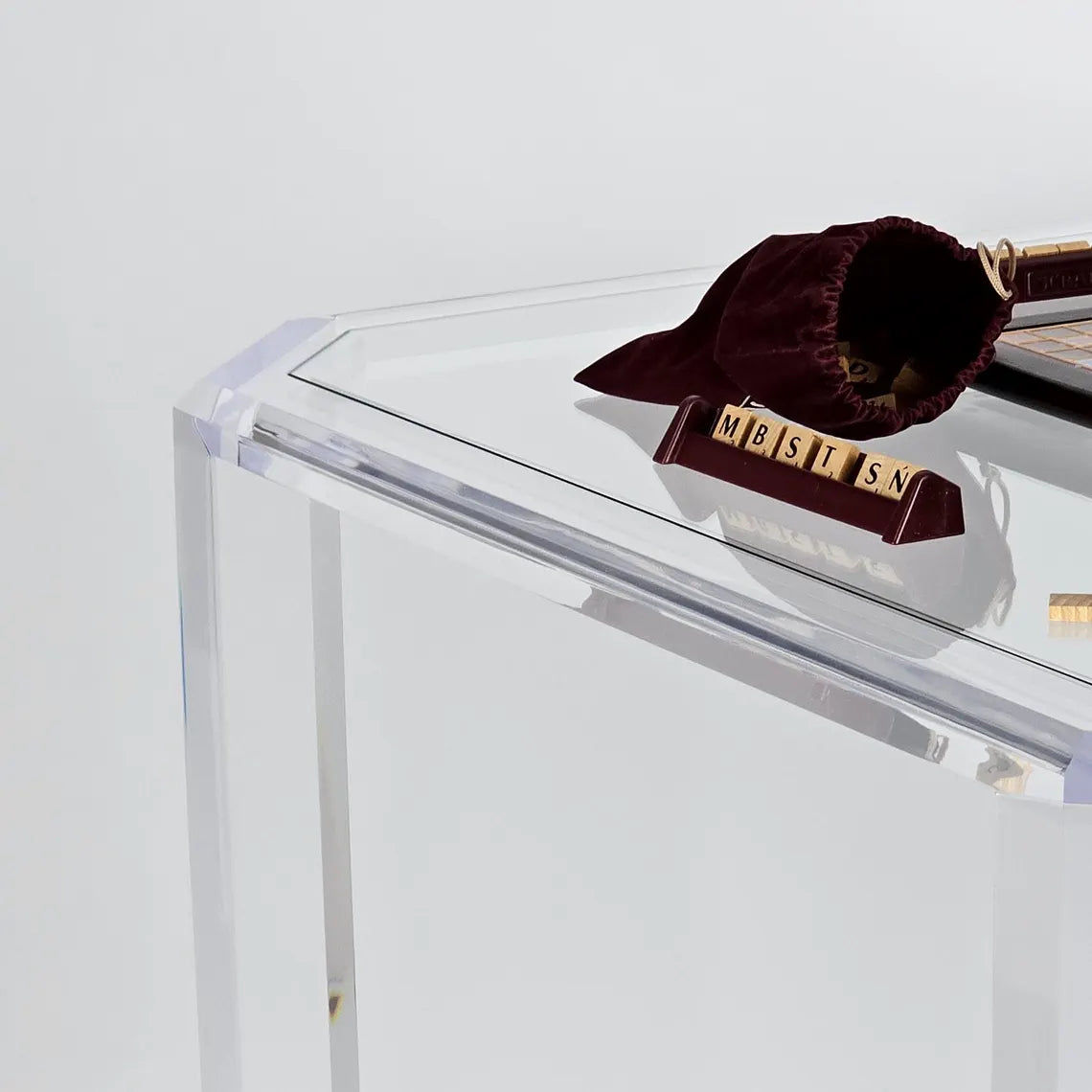 Clear acrylic game table with beveled edges and corners