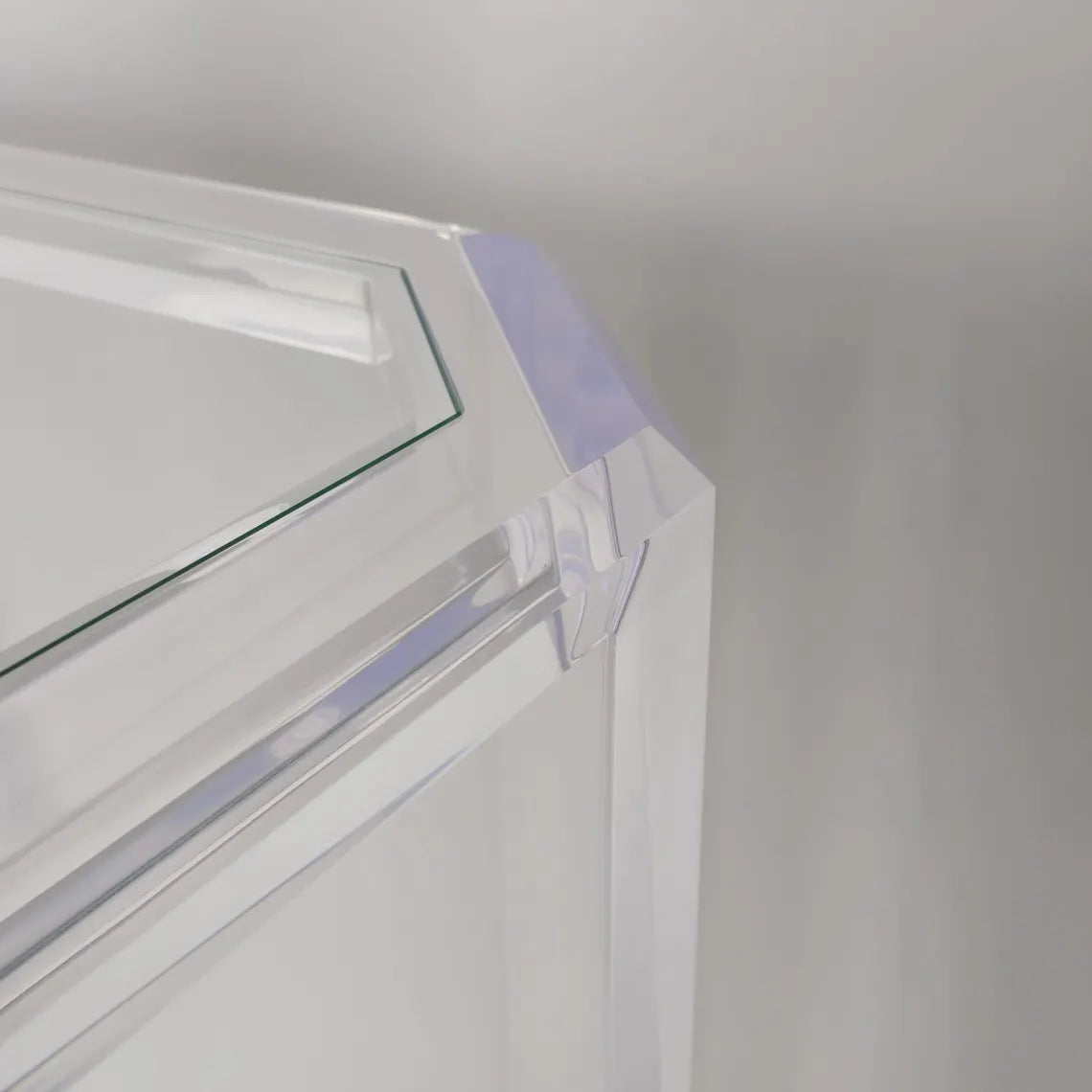 Clear acrylic game table with beveled edges and corners