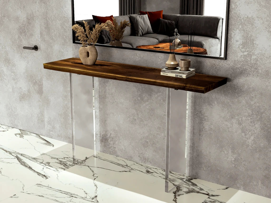 Clear acrylic console table with a light wood top