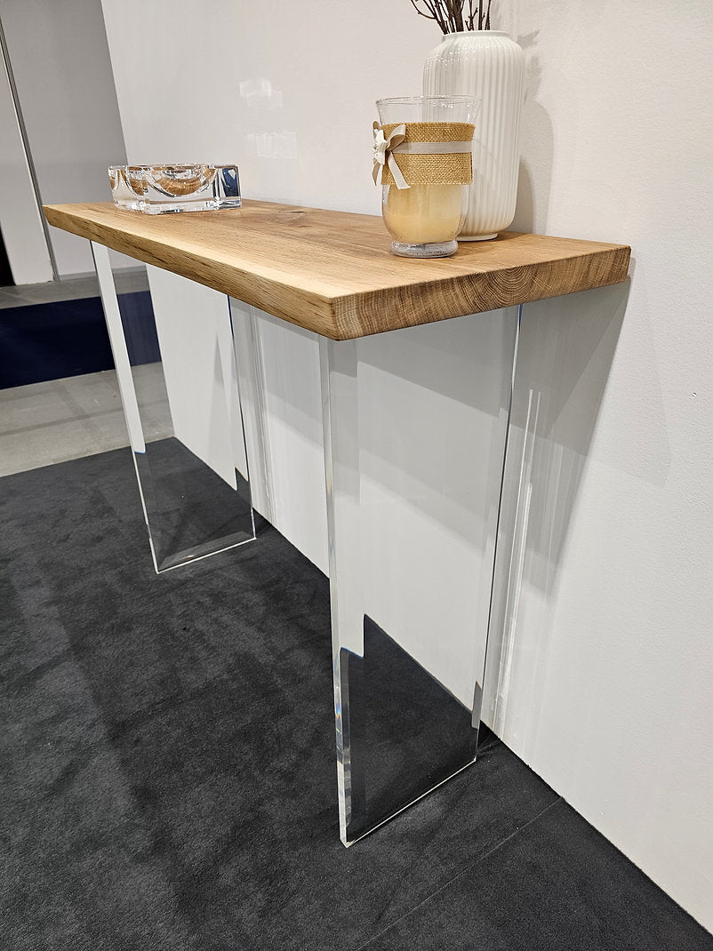 Clear acrylic console table with a light wood top