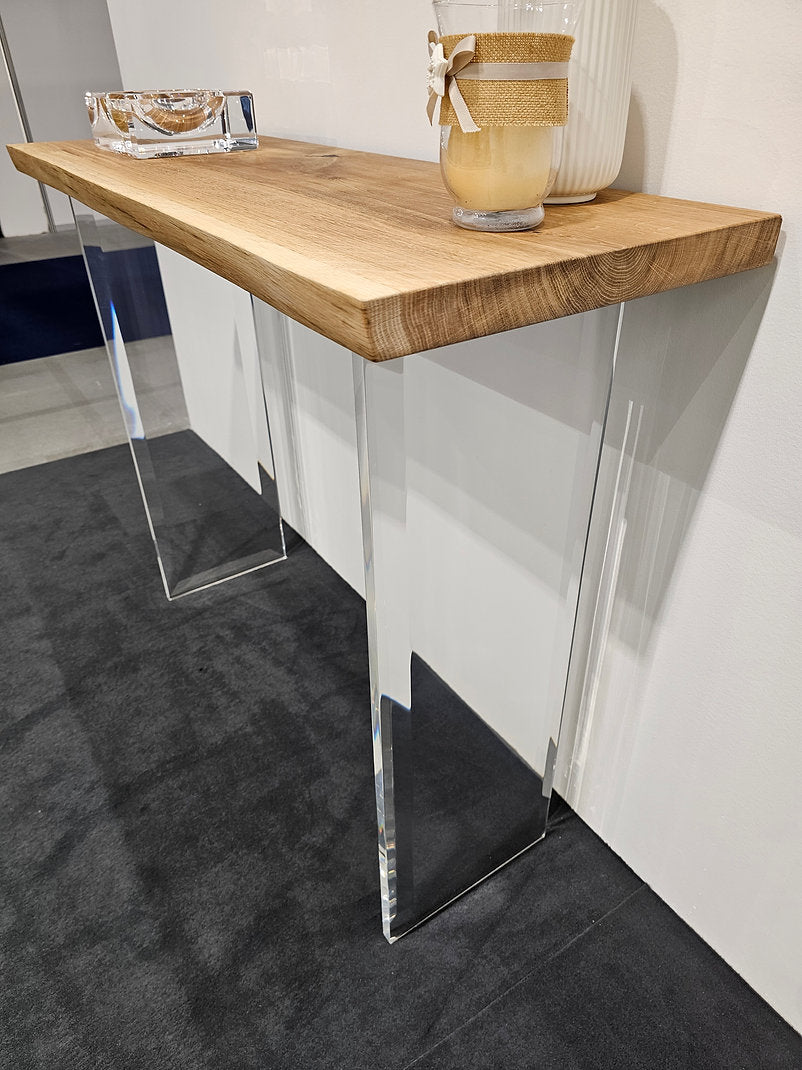 Clear acrylic console table with a light wood top